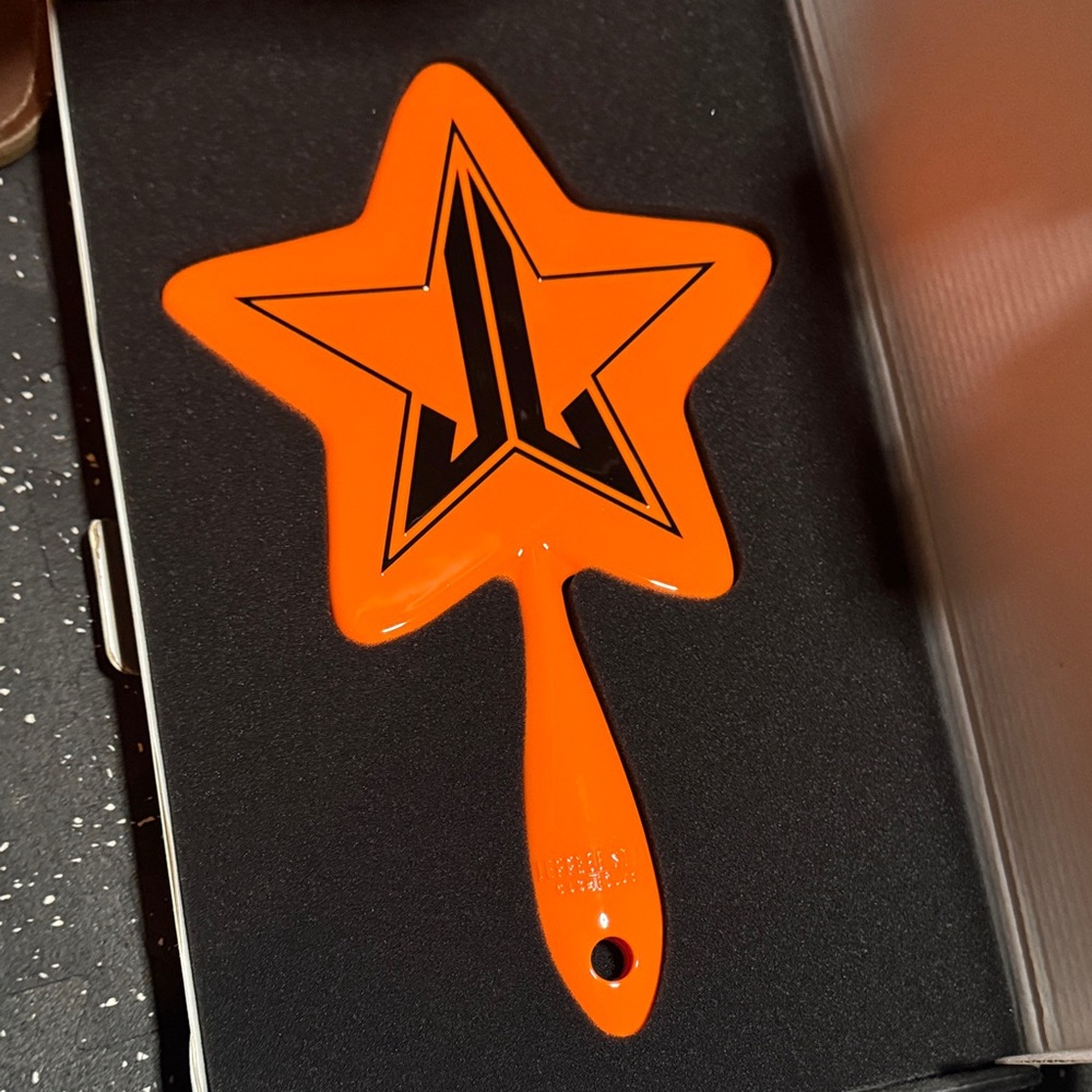 Jeffree Star Bold Orange Star Design